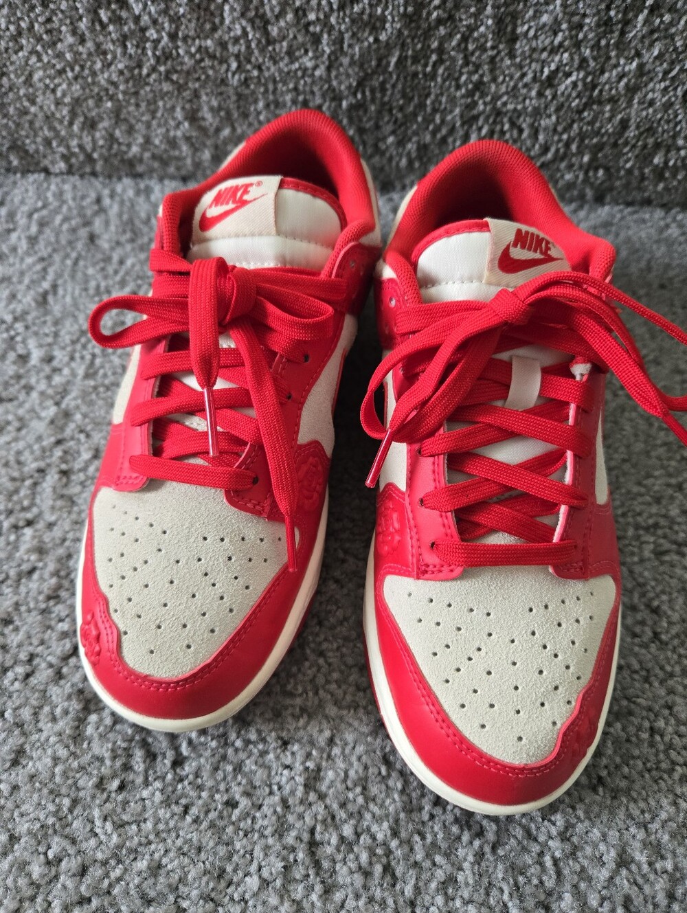 Nike Red and White Low-Top Sneakers with Bold Red Accents